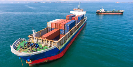 Open ocean barge transshipment